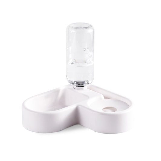 White pet water and food bowl set on a white background.