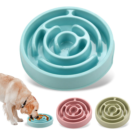Slow feeder dog bowl for pets with a dog eating from it, and two additional bowls in pink and green.